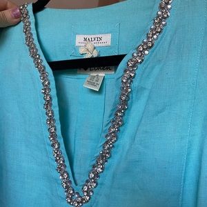 Tunic with jeweled neckline